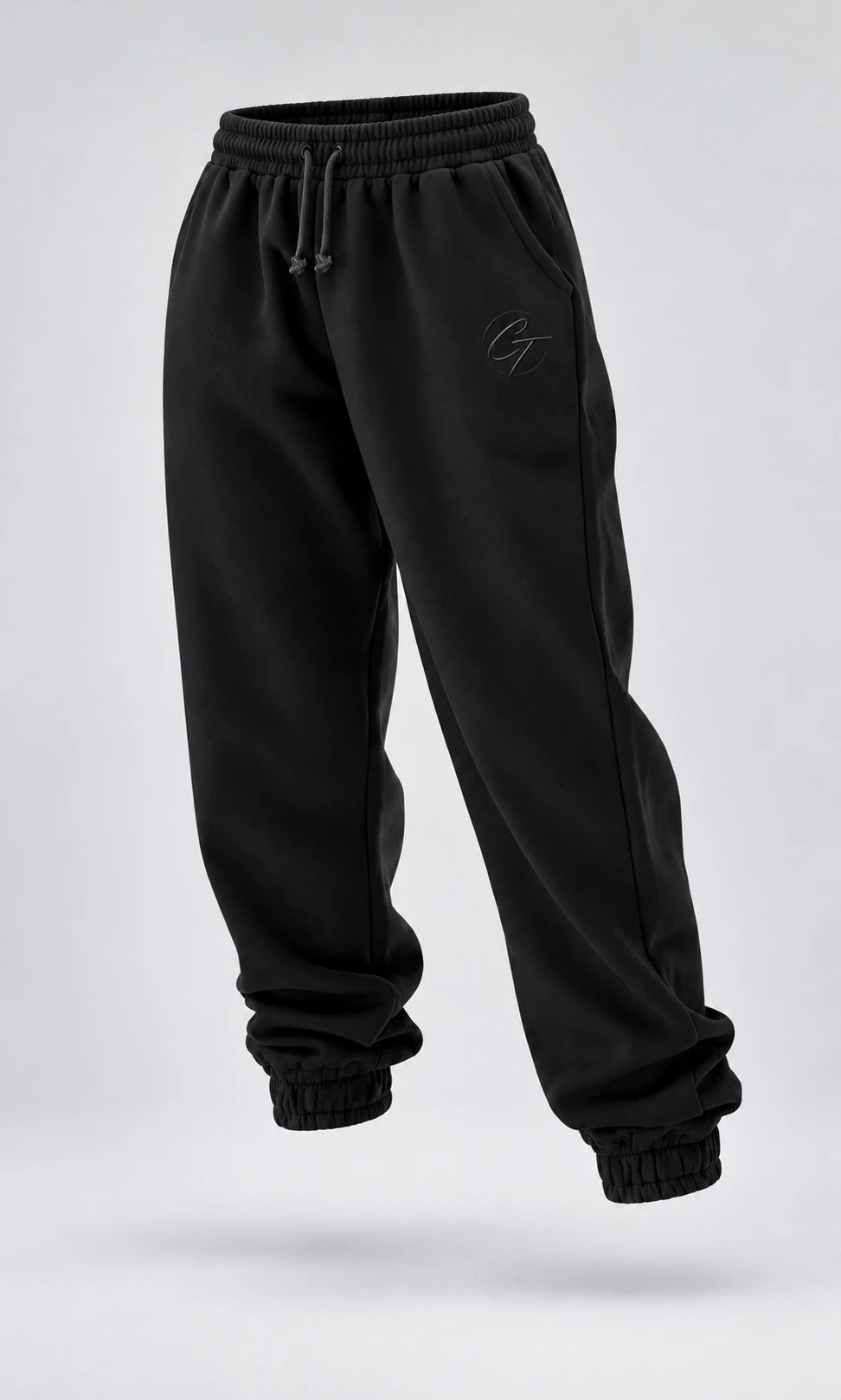 Floating black CT Identity joggers with a gloss black CT signature beside the left front pocket
